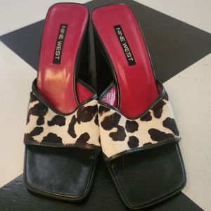 Nine West; black and white cow print sandals.